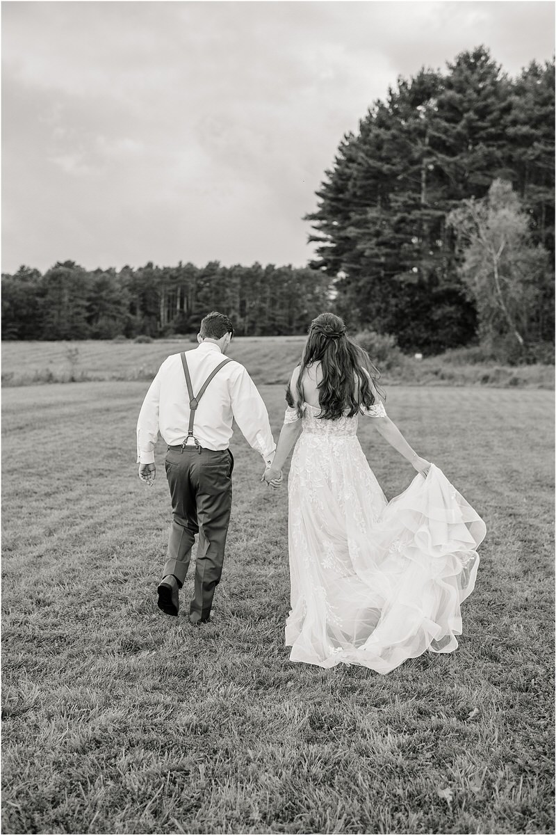 Bride and groom walk together for Rachel Campbell Photography