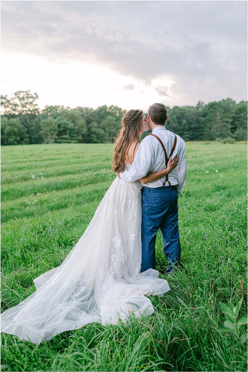Bride and groom admire the sunset holding each other close for Rachel Campbell Photography