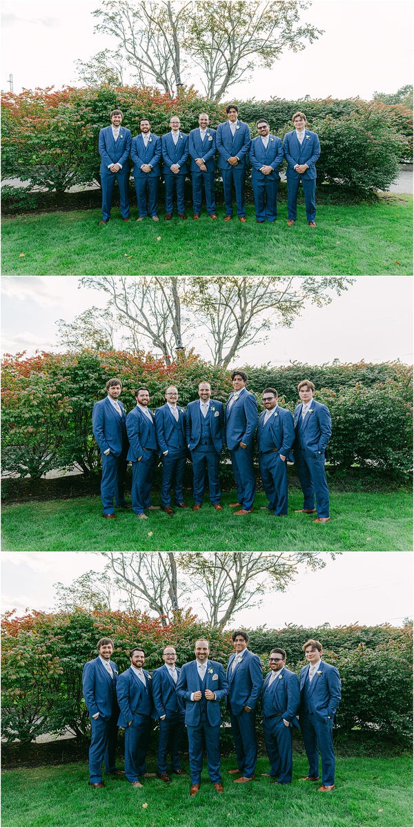 Groomsmen stand with groom at The Red Barn at Outlook Farm