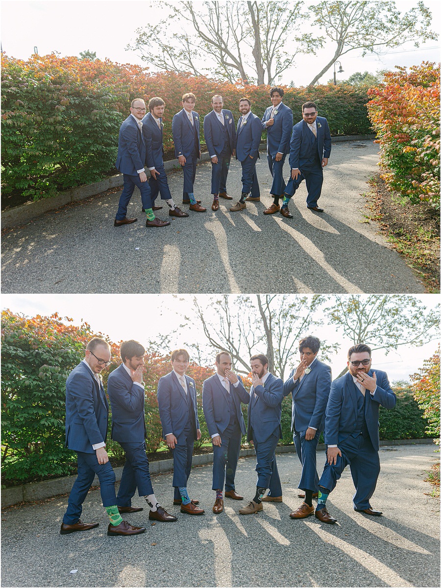 Groom and groomsmen show off their custom socks at The Red Barn at Outlook Farm