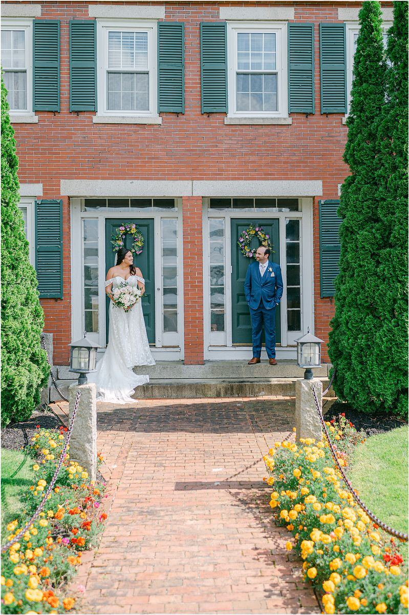 Husband and wife smile at each other for Rachel Campbell Photography