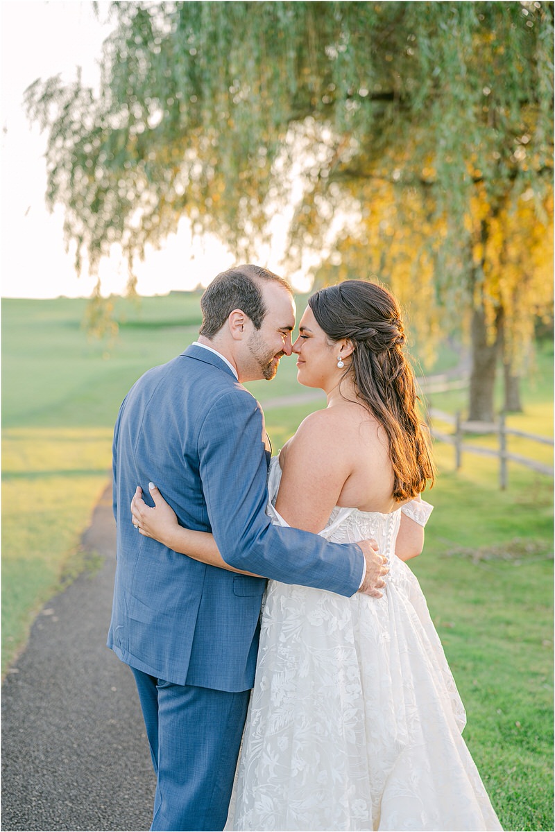 Couple put their heads together for Rachel Campbell Photography